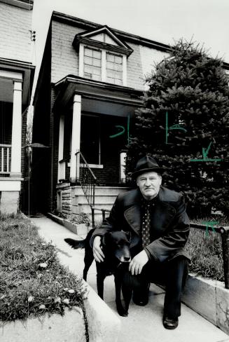 Lost their home: Kenneth McLeod and his dog Blackie visit the Munro St