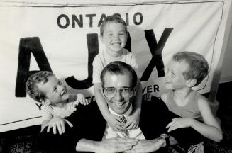 Ajax actors: Ajax Mayor Bill McLean is surrounded by the Lundrigan brothers - David, 6, left, his twin Ryan, right, and Darren, 4