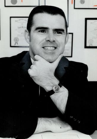 Lyman MacInnis. Hull's tax expert