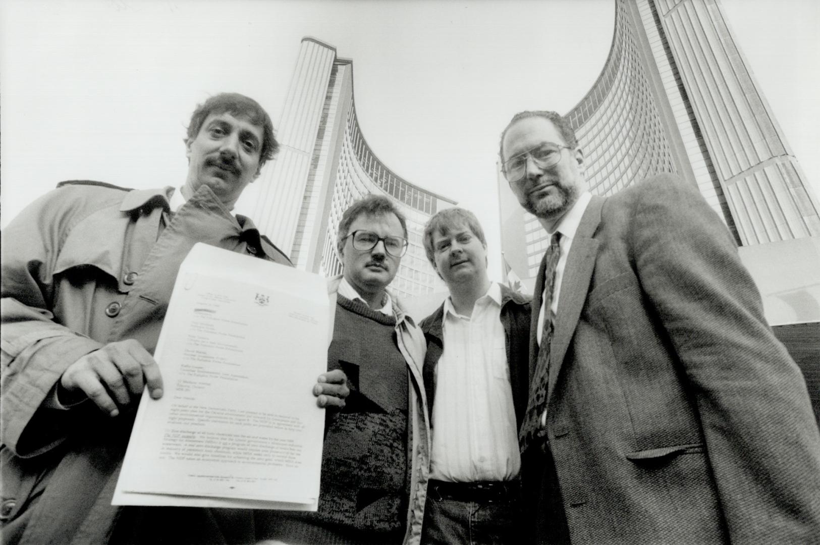 Green Plan: From left, Stephen Hall, Glen McKnight, Kevin Jardine and Gary Gallon, members of an environmental coalition, gather at Toronto City Hall yesterday to back energy efficiency