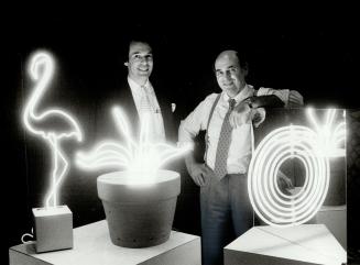 Electrifying Markle brothers: Jack (left) and Sam stand by their sculptures