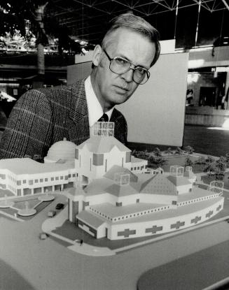 Model centre: Pickering's town manager Noel Marshall is shown with a model of the proposed $13 million town hall