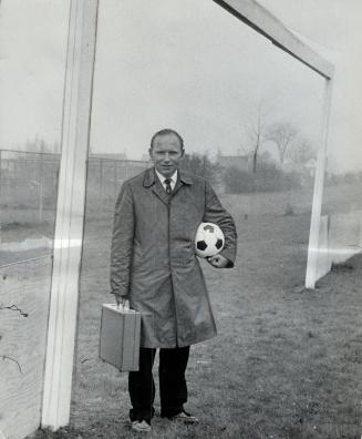 Dissappointed Joe Martin stands beside the soccer field he built on the grounds of a Scarborough collegiate to demonstrate his revolutionary new form of the game