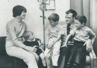 Normal family life can be lived by cerebral palsy victims, if they are independent and can find work, say Nancy and Jim Mawhinney, photographed here with their children, Kelly, 3, next to her mother, Danny, 7, on his father's right knee, and Shawn, 6