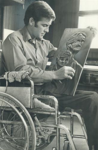 Paraplegic John Meyers. In spare time from United Appeal work, he sculpture