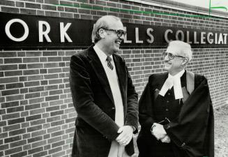 Swapping experiences: Judge Kenneth Mawson (left), of the court of Canadian Citizenship, chats with Robert McMinn, principal of York Mills Collegiate