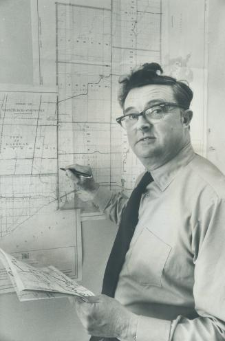 Harry Mitchell, the man in charge of Ontario's land purchases for the new airport city, says false rumors create the biggest problems.