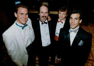 Part of the stable: Player rep Don Meehan, second from left, surrounded by a few stellar clients: From left, Canuck rookie Trevor Linden, Flames' playoff MVP Al MacInnis, and Habs' Norris winner Chris Chelios