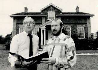 Looking back: Applewood's Dennis Mills and Robert Sage stand in front of the birthplace of James Shaver Woodsworth, founder of the Co-operative Commonwealth Federation