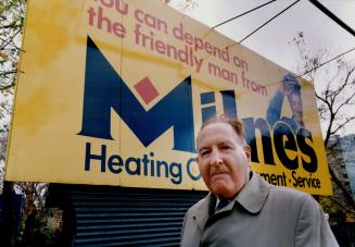 Posing in front of his company's billboard, John Milnes, owner of Milnes Fuel Oils Ltd., sees nothing that's likely to raise oil prices.