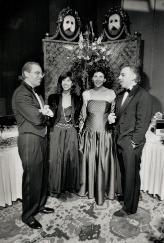 Above, from left to right: Monaco Group's Joe Mimran and wife Sharon, with brother Saul and wife Ann, wearing Alfred Sung.