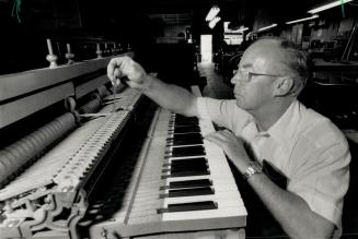 In tune: James Moffat tunes a piano in his Scarborough shop
