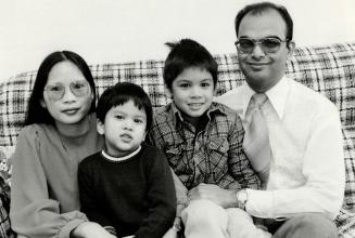 Immigration woes: Suresh and Anna Murarka, pictured above with their children, Anil, 3, and Lin, 7, have been fighting for four years to bring Anna's parents and two sisters here from Hong Kong, but have been refused because one sister is mentally retarted and has cerebral palsy