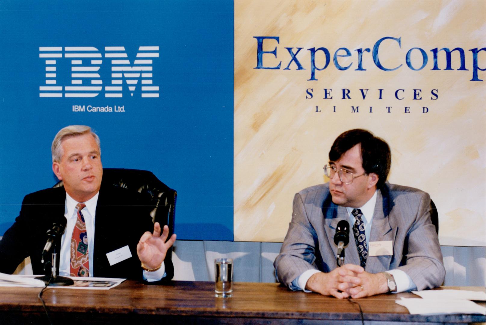 Send in the clones: Don Myles of IBM Canada, left, and Andre Turgeon announce launch of new company that will sell low-cost computers yesterday.