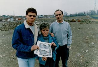 Shattered dream: Rob Murphy, 18, stands with his parents, Rose and Hugh, on the Mississauga lot where their new home was to have been.