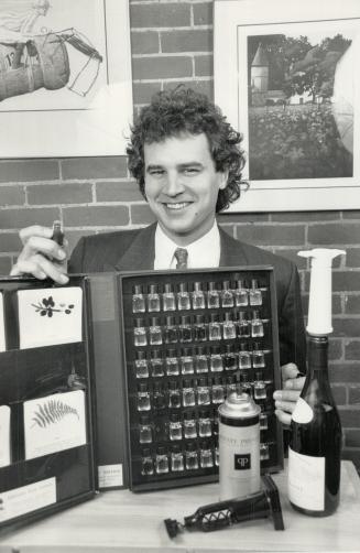 John Nadeau fo The Wine Establishment shows off a selection of Christmas gifts for wine fanciers.