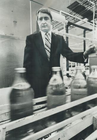 Banning non-returnable bottles would not reduce solid waste or litter, says soft-drink executive D. G. Ottaway, above.