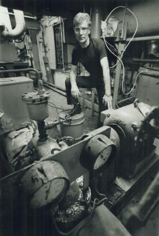 Tradesman: Electrician Andrew Paterson, top, faces an uncertain future in his government job, but Gary Laver feels secure with General Motors.