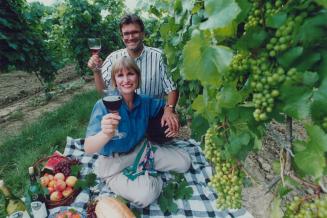 Fine Wining: Len and Wendy Pennachetti, owners of Cave Spring Cellars in Beamsville, salute the season.
