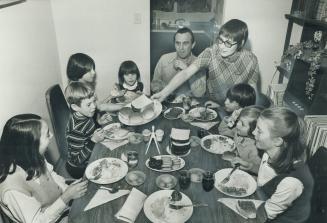 It's a full table when Mary and Edward Pentecost have dinner with their seven children who are at home, at Bramalea - four foster children and three natural