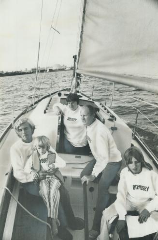 Left: Edward Perrault and family set sail in the Odyssey from its mooring at Ontario Place.