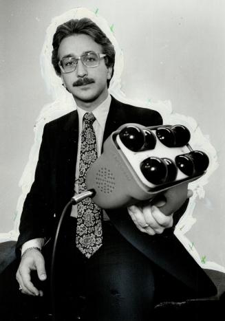 Ed Noble and his $800 Vibrotoner that's used by the stars.