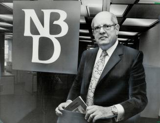 Ready for the grand opening: Tomorrow marks the day the National Bank of Detroit (Canada) starts doing business as a Canadian bank and president Gerald O'Neill is ready for it