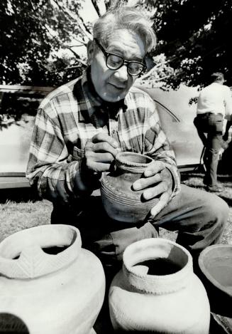 Bill Parker demonstrates the ancient pottery crafts of his Indian ancestors.