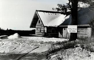 Presidential home: This log house in the Midhurst area, just north of Barrie, is the home of Chuck Peacock, president of Building With Logs Ltd