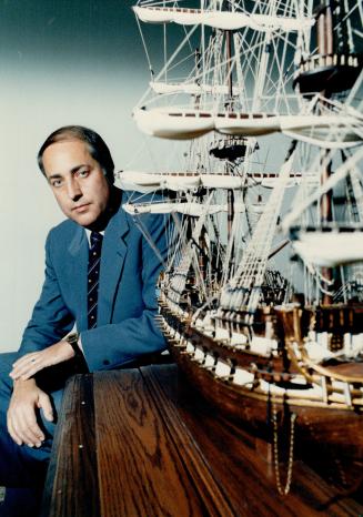 Shipshape: John Pennie, of Omnibus Computer Graphics, sits beside his model galleon