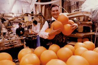 Dom Petruccelli holds some of his film's orange sponge balls