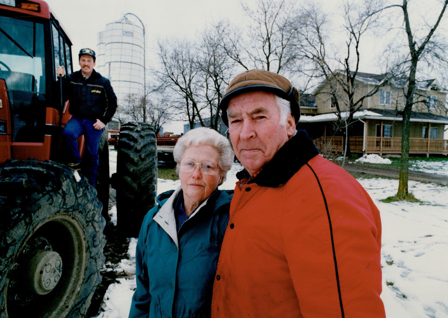 Dumped on: Newton and Leona Piercey and their son Paul, in tractor, were told last Friday their Caledon farm, near Bolton, is one of five remaining contenders to be the next regional dump for Peel
