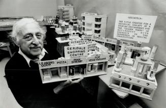 Keeps him busy: Jack Pollick takes pride in his pill-bottle model of a community he dubbed Geriatria