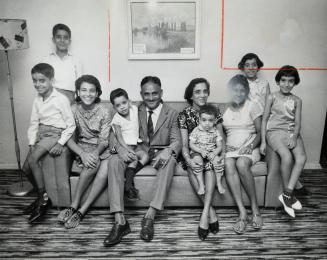Cecil Preyra with wife Lina and two of his sons, Ronnie, 4, and Alan, 2