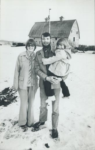 Photos show: Prange family with barn in background.
