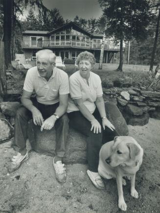 New home: Bill and Betty Roszell, with dog Sophie, are ready to enjoy the Haliburton highlands full time.