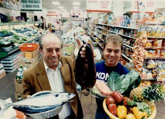 Biggest grocer: Tony Rebelo, right, says his father, Norberto is living proof that there's no better country in the world than Canada if you have ambition