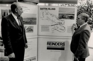 Heavy work: Fred Reinders, inset, looks at a map of Baffin Island where his firm built a reservoir in permafrost to serve the community of Pangnirtung