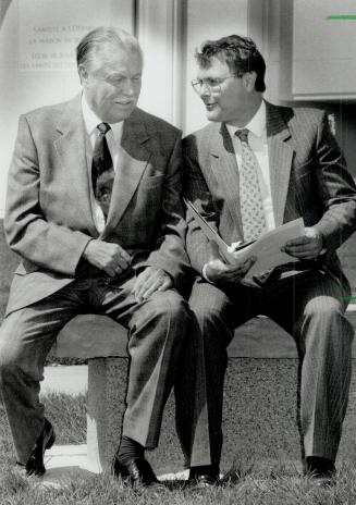 Officials: Left, Arnold Roberts, president of the Church of Jesus Christ of Latter-day Saints in Brampton and, right, Dick Robertson, director of public communications