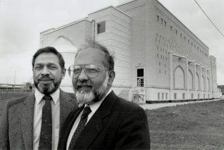 Symbol of the Future: Chairman Haroon Salamat, right, and secretary Afzal Abdool, of the Toronto and Region Islamic Congregation, on the site of first phase of a $10 million Islamic Centre in North York
