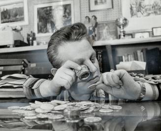 Coin and stamp dealer Albert Rosen, looking over some coins from his own collection, says he believes that murdered 70-year-old fellow-dealer ilton Ritter's collection could fetch nearly $5,000,000