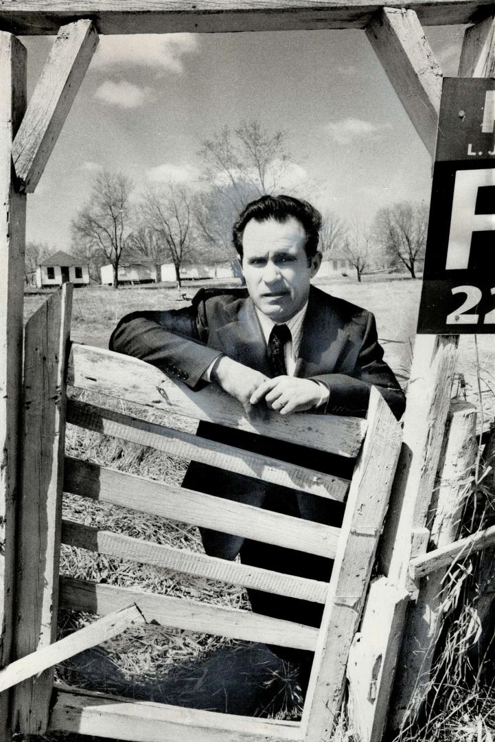 Frank Russo stands on land frozen by the Parkway Belt scheme