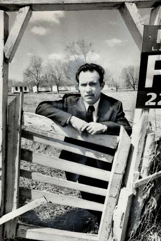 Frank Russo stands on land frozen by the Parkway Belt scheme
