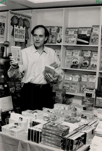 Quality fare: Hy Sarick, who co-owns The Children's Book Store Audio and Video store, has no fear that videos will drive kids away from books.
