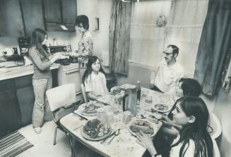 There are seldom extras or luxuries on the dinner table at the home of Sam and Jean Schott, who, with their four children, live in an Ontario Housing project on Kingston Rd