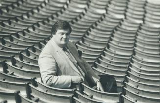 Athletes' friend: Agent Gil Scott may not be much loved in Winnipeg, from where he spirited Dieter Brock, but Scott, here perched in Exhibition Stadium, has won a lot of respect in other Canadian Football League cities