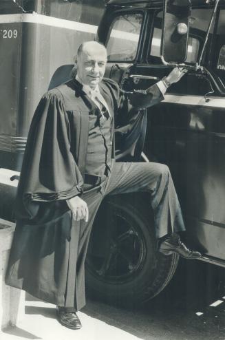 New lawyer Ross Snobelen with one of his company's trucks