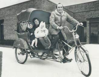 Is there a rickshaw in your future? The gasoline shortage doesn't bother Lorne Shields, a 30-year-old Downsview manufacturers' agent, as he takes his wife Suzanne and their daughters Jessica, 2, and Rebecca, 7 months, for a spin in the rickshaw be just imported from Taiwan to add to bicycle collection