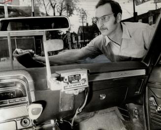 High school teacher Peter Scher in cab driver role. It is one of jobs he will do in summer to help him save money for house