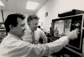 Letter perfect: Malcolm Saubolle, left, and Peter Hanink of Bridge Integrated technologies Inc